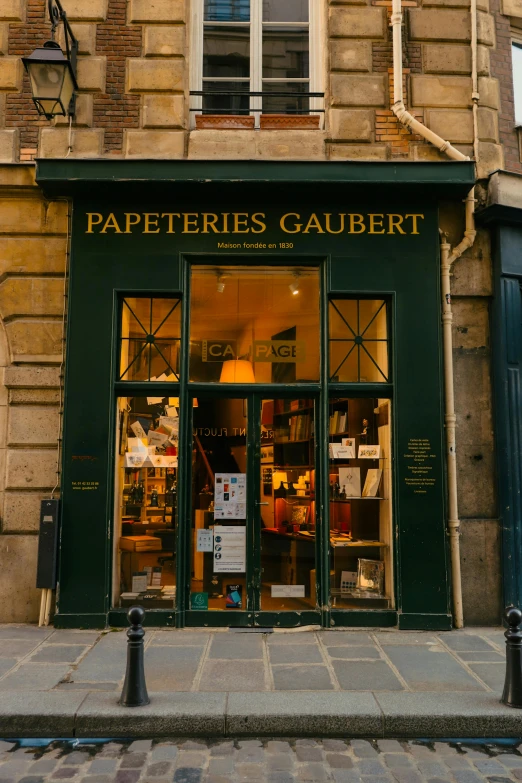 a store front with a clock tower in the background, an album cover, inspired by Albert Paris Gütersloh, pexels contest winner, papier colle, chaumet, 12th century apothecary shop, exterior view