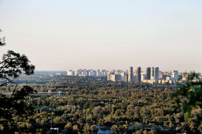 a view of a city from the top of a hill, beijing, buenos aires, fan favorite, view of forest