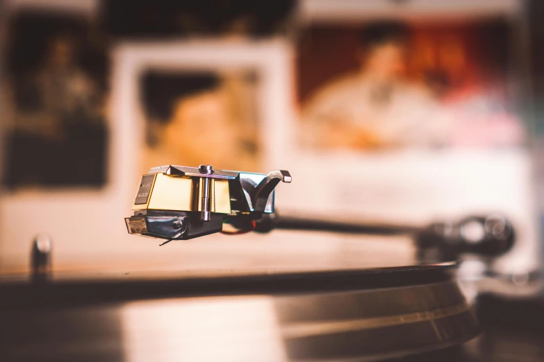 a close up of a record player's turntable, an album cover, by Daniel Lieske, unsplash, private press, grand piano, tilt - shift, 1980s photo, instagram photo