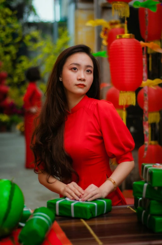 a woman in a red dress posing for a picture, inspired by Ai Xuan, square, 2 0 yo, market, high quality picture