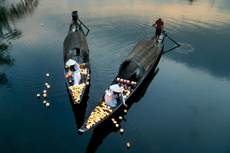 a couple of boats that are sitting in the water, by Patrick Pietropoli, unsplash contest winner, conceptual art, chinese lanterns, walk in a funeral procession, lpoty, lagoon