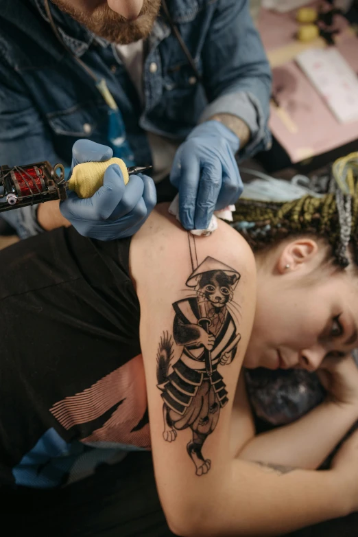 a man getting a tattoo on his arm, by Adam Marczyński, trending on pexels, renaissance, a person with a raccoon head, fullbody painting, pirate woman, teenage girl