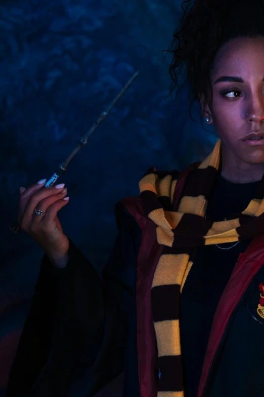 a woman in a harry potter costume holding a wand, trending on pexels, photorealism, lighting, ashteroth, vanessa morgan, instagram photo