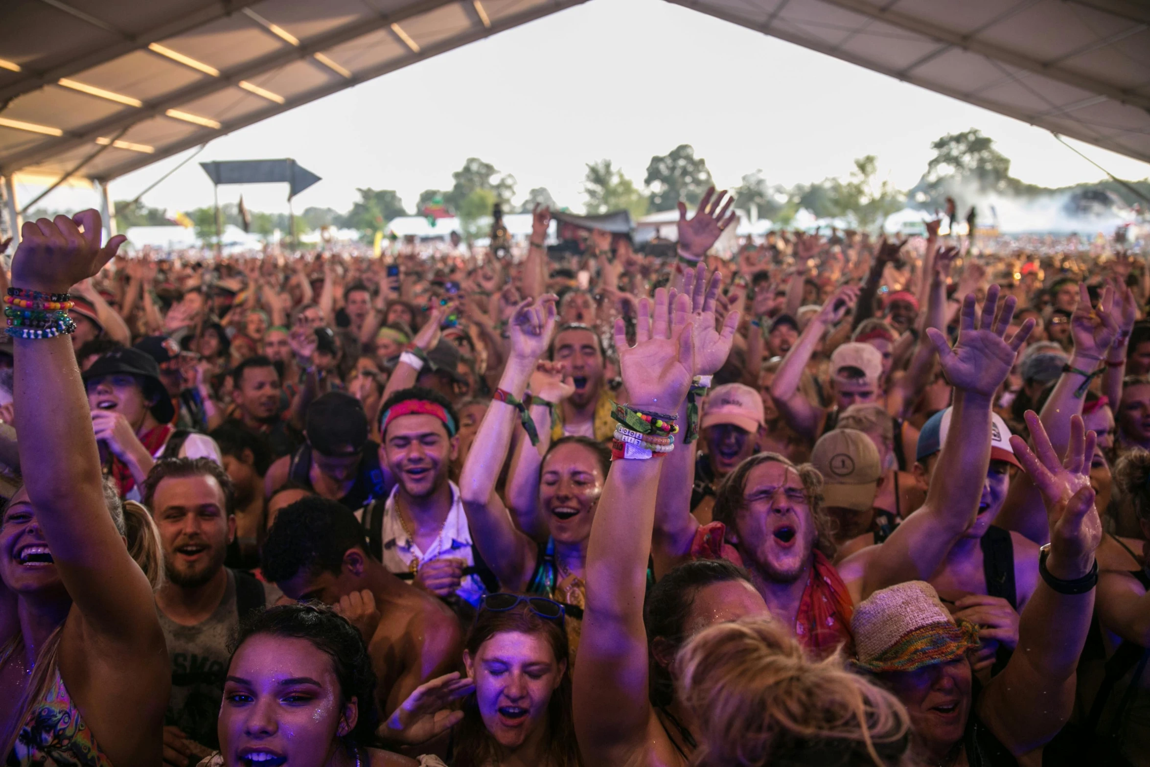 a large crowd of people at a music festival, in louisiana, triumphant pose, instagram photo, inside a grand