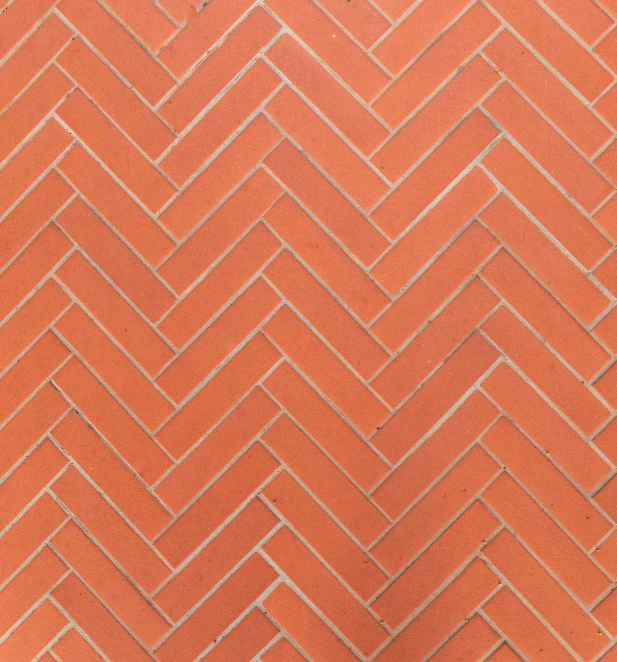 a fire hydrant sitting next to a brick wall, an album cover, inspired by Fernando Gerassi, op art, herringbone floor, terracotta, closeup - view, tile