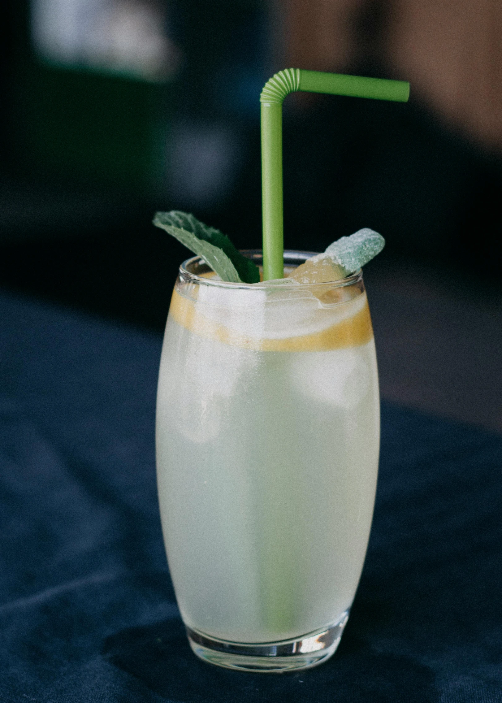 a close up of a drink in a glass with a straw, by Carey Morris, unsplash, renaissance, pale green glow, with a long white, lemonade, square