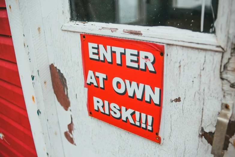 a red sign that says enter at own risk, pexels contest winner, diy, ((rust)), instagram post, 1 9 5 0 s