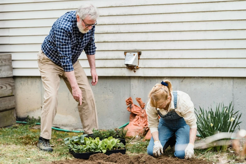 a man and a woman working in a garden, pexels contest winner, fan favorite, two old people, head down, avatar image