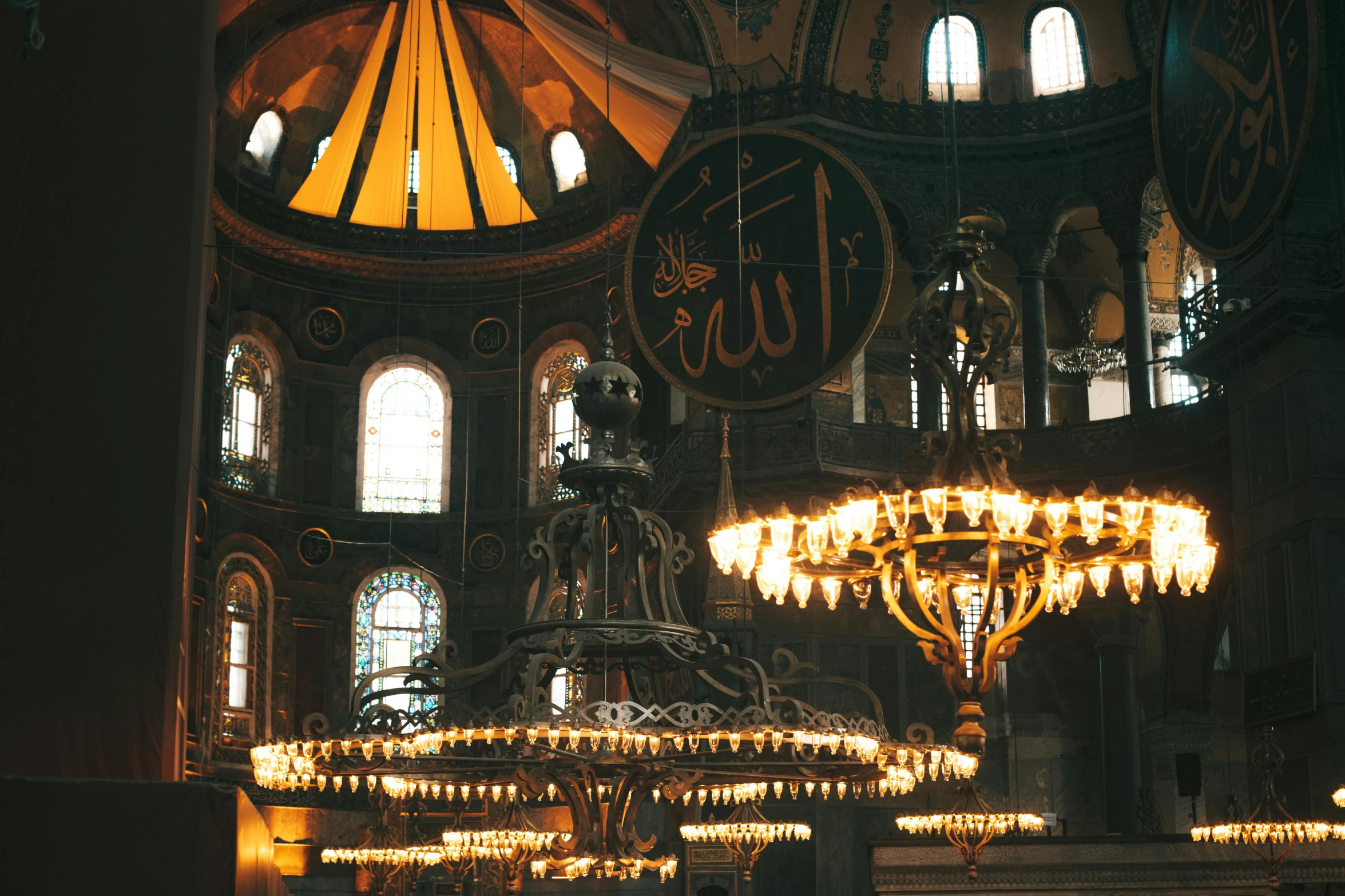 a large chandelier hanging from the ceiling of a building, unsplash contest winner, hurufiyya, with great domes and arches, 🦩🪐🐞👩🏻🦳, christian saint, turkish and russian