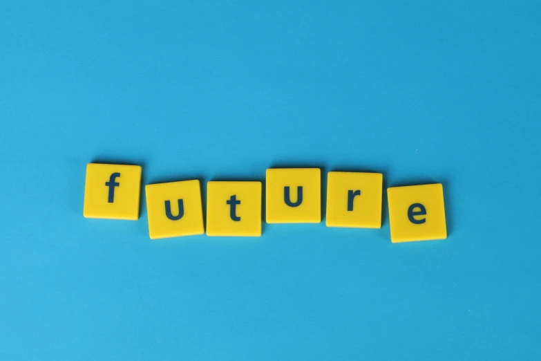 the word future spelled with scrabbles on a blue background, by Julia Pishtar, gen z, yellow, 3 4 5 3 1, a dream