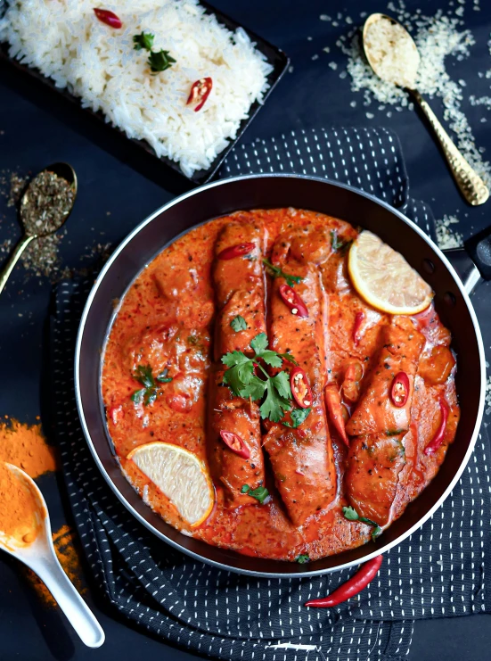 a pan filled with food sitting on top of a table, inspired by John Steuart Curry, hurufiyya, salmon, jaw dropping, food photography”, 8k))