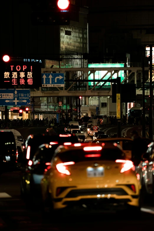 a city street filled with lots of traffic at night, reddit, mingei, street signs, high quality photo, square, 2077