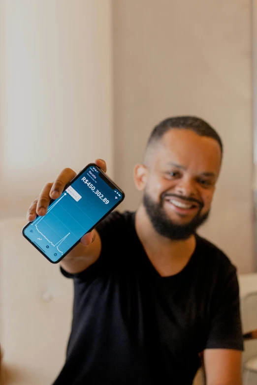 a man holding a credit card in his hand, a hologram, by Daniel Seghers, pexels contest winner, iphone selfie, jeffrey wright, official screenshot, luis melo