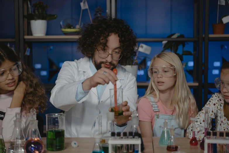 a group of children working in a science lab, a portrait, pexels, tv commercial, avatar image, charli bowater, giorgio a. tsoukalos