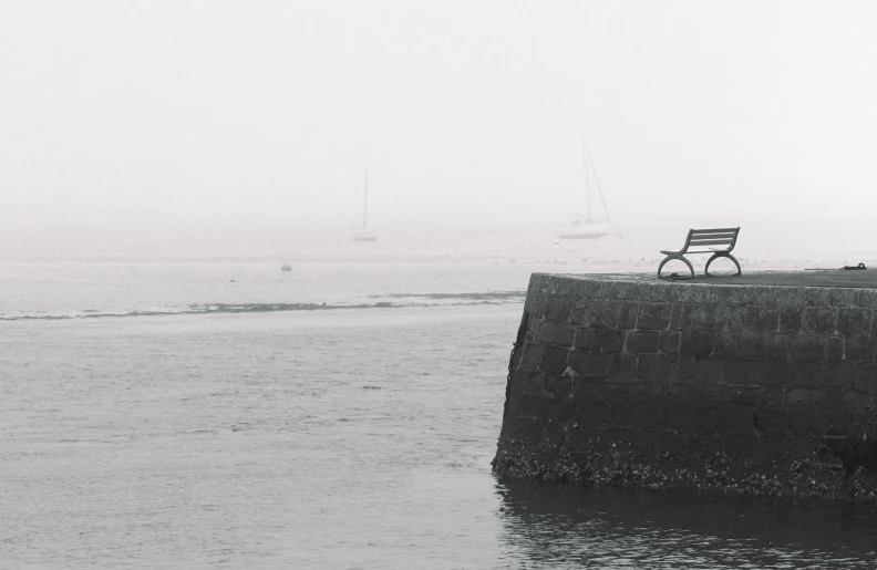 a black and white photo of a bench by the water, pexels contest winner, postminimalism, maryport, white fog painting, harbor, watch photo