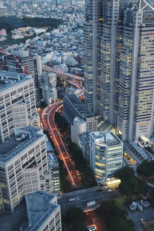 an aerial view of a city at dusk, by Yasushi Sugiyama, unsplash contest winner, modernism, square, japonisme 3 d 8 k ultra detailed, european japanese buildings, detailed 4k photograph