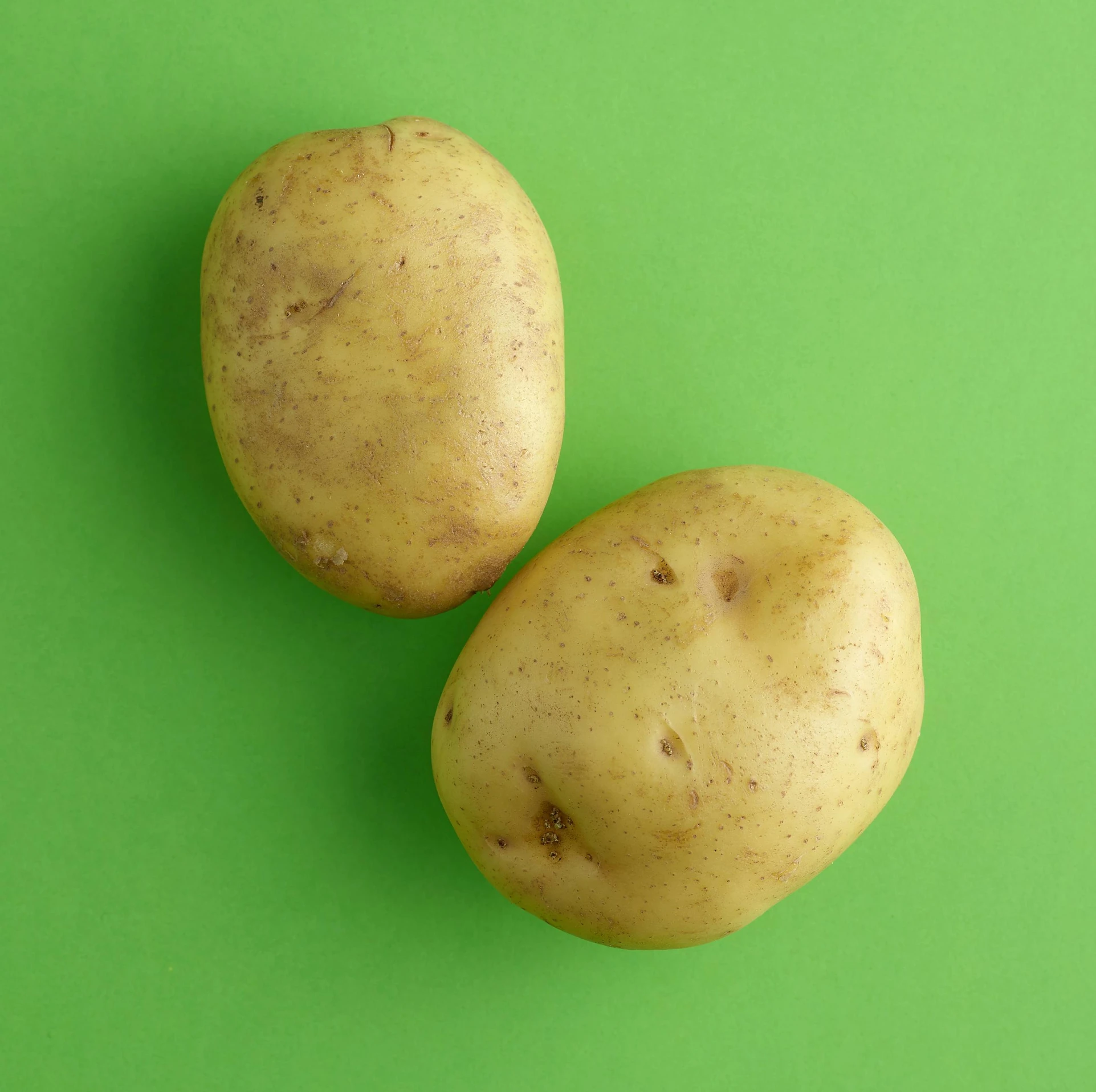 two potatoes sitting next to each other on a green surface, square, extra crisp image, fan favorite, poggers