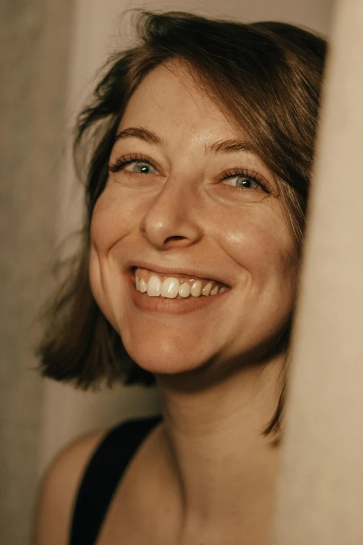 a close up of a person with a toothbrush, inspired by Zoë Mozert, smiles slightly, photoshoot portrait, soft lighting from above, right - half a cheerful face