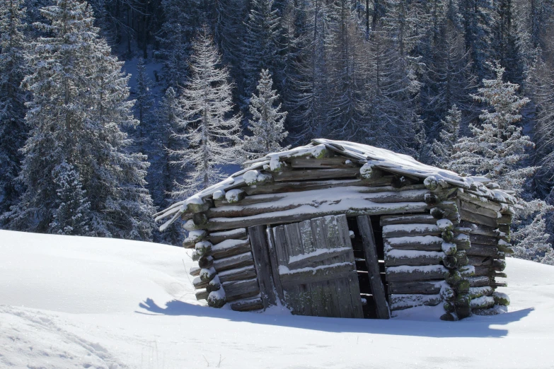 a log cabin sitting on top of a snow covered slope, pexels contest winner, renaissance, the tunnel into winter, thumbnail, alpes, worn