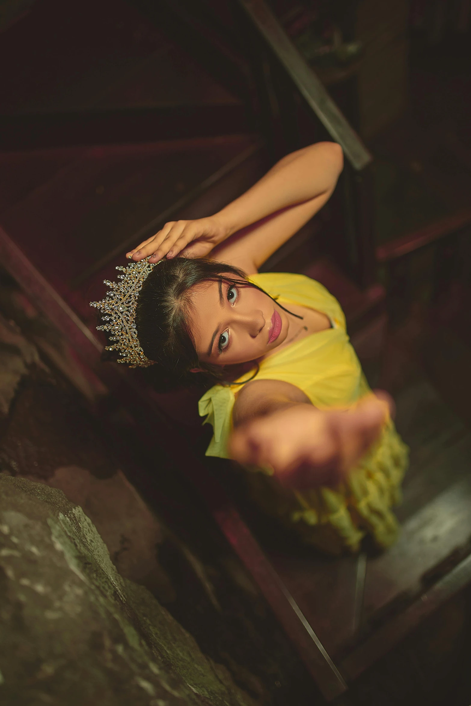 a woman in a yellow dress posing for a picture, inspired by Elsa Bleda, pexels contest winner, renaissance, tiara, top down shot, threatening pose, promotional image