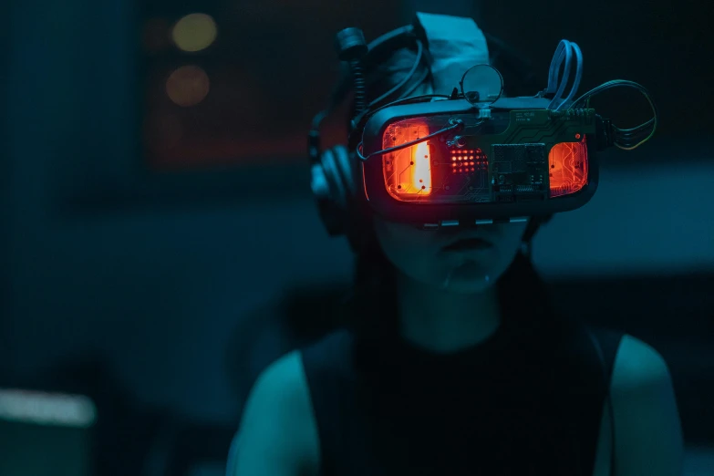 a close up of a person wearing a pair of headphones, cyberpunk art, inspired by Simon Stålenhag, unsplash, serial art, night vision goggles, inside her surreal vr castle, stood inside a futuristic lab, oled visor over eyes