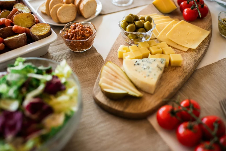 a table topped with lots of different types of food, by Daniel Lieske, pexels contest winner, extra cheese, profile image, middle close up shot, avatar image