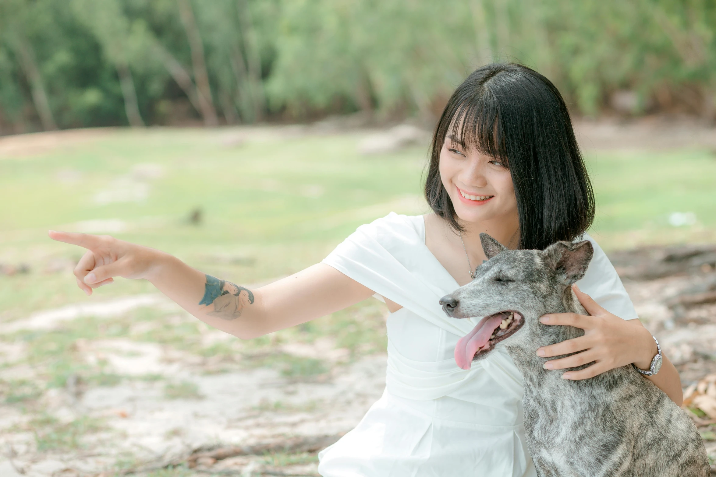 a woman sitting on the ground with a dog, pexels contest winner, of taiwanese girl with tattoos, avatar image, youtube thumbnail, pet rat on shoulder