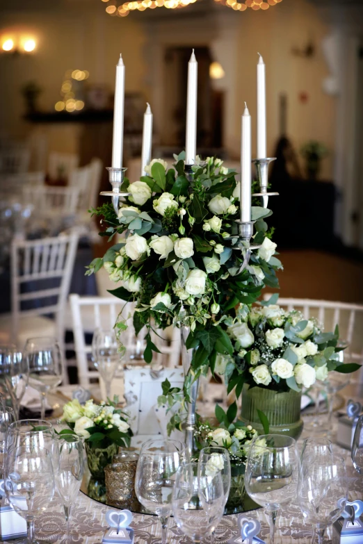 a table topped with lots of white flowers and candles, romanticism, award-winning crisp details”, graphic”