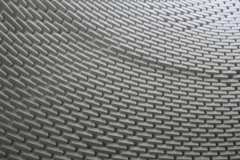 a black and white photo of the inside of a building, inspired by Andreas Gursky, flickr, concrete art, very detailed curve, woven armour, 4 k close up, grey metal body