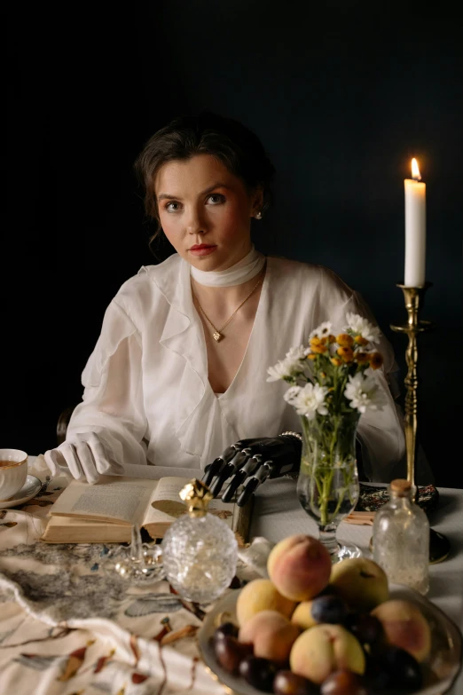 a woman sitting at a table with a plate of fruit, a portrait, inspired by Hedda Sterne, unsplash, renaissance, white long gloves, candle lighting, loving stare, wearing 1890s era clothes