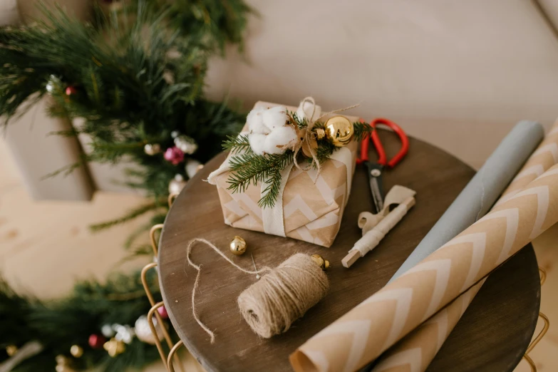 a pair of scissors, twine of twine of twine of twine of twine of twine of twine of twine, by Alice Mason, trending on pexels, wearing festive clothing, brown paper, tabletop, handcrafted