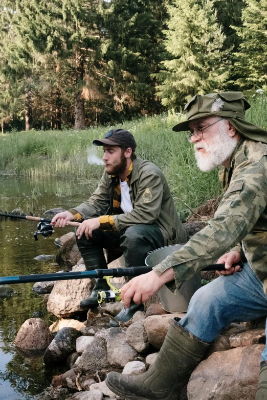 a couple of men sitting next to a body of water, overalls and a white beard, fishing pole, greg rutkowski and jakub rebelka, camo