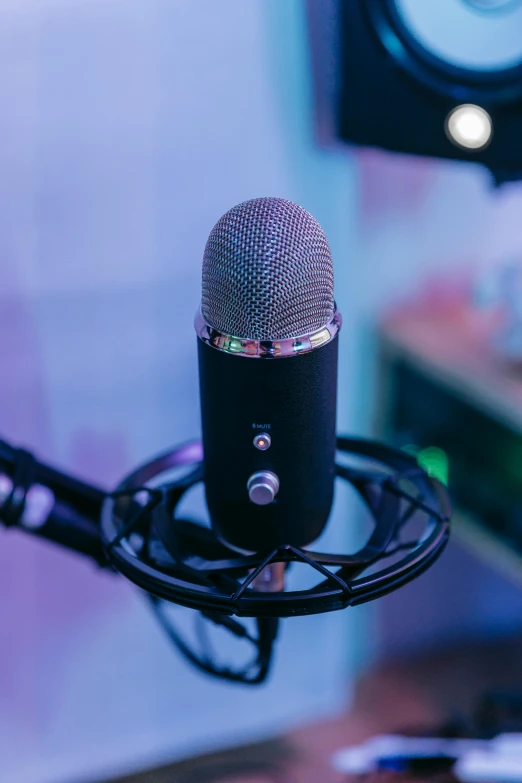 a close up of a microphone in a recording studio, an album cover, trending on pexels, altermodern, esports, black and blue and purple scheme, multiple stories, full device