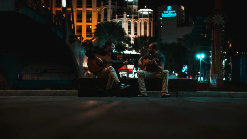 a couple of people that are sitting on a bench, by Niko Henrichon, pexels contest winner, las vegas at night, man playing guitar, paul barson, in a square