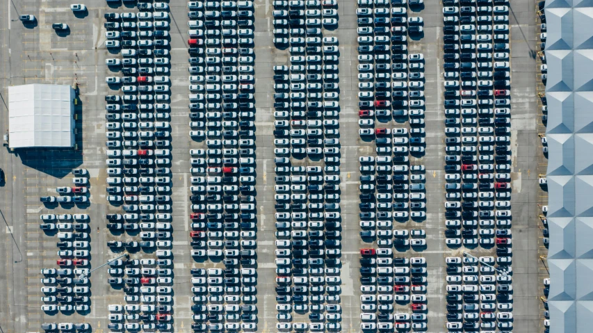 a parking lot filled with lots of parked cars, by Werner Gutzeit, unsplash, conceptual art, dezeen, square, port, photographed for reuters