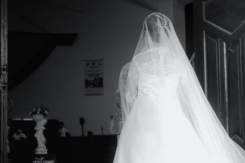 a black and white photo of a woman in a wedding dress, by Kristian Kreković, unsplash, scene from church, photo realistic”, transparencies, 15081959 21121991 01012000 4k