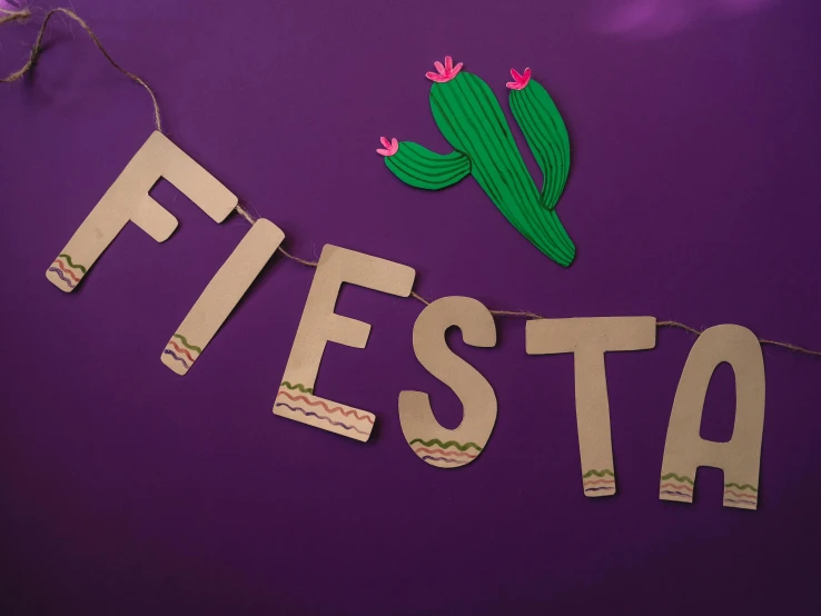 a sign that says fiesta hanging from a string, inspired by Agustín Fernández, trending on unsplash, papercraft, ((purple)), cactus, fancy dress