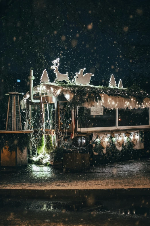 a restaurant covered in christmas lights on a rainy night, by Adam Marczyński, pexels contest winner, graffiti, outside in snow snowing, food stall, square, dark. no text