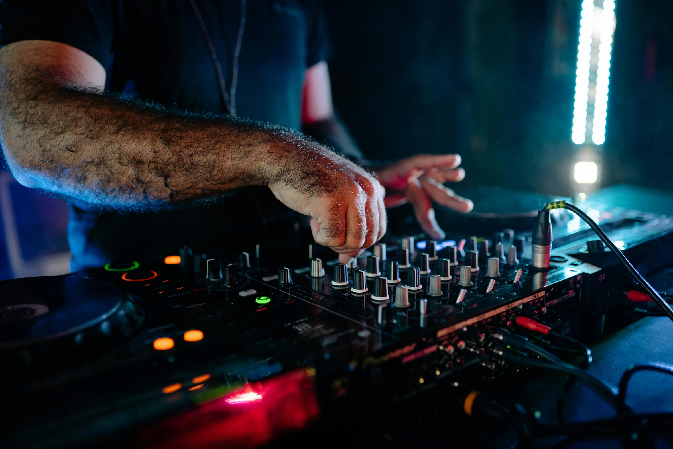 a close up of a person using a dj controller, by Niko Henrichon, at a bar, scratches on photo, trending photo, 15081959 21121991 01012000 4k