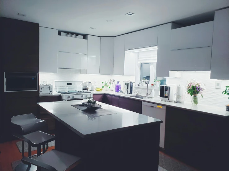 the kitchen is clean and ready for us to use, pexels contest winner, light and space, volumetric lighting 4k, cool purple grey lighting, instagram post, white warm illumination