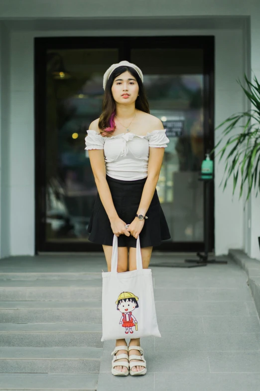 a woman standing in front of a building holding a bag, a cartoon, inspired by Takehisa Yumeji, pexels contest winner, wearing white camisole, anime thai girl, wearing a french beret, at a mall