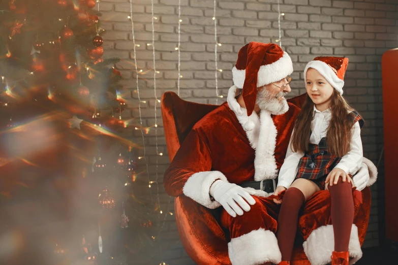 a little girl sitting in a chair next to a santa clause, pexels, avatar image, cute girls, high resolution, group photo