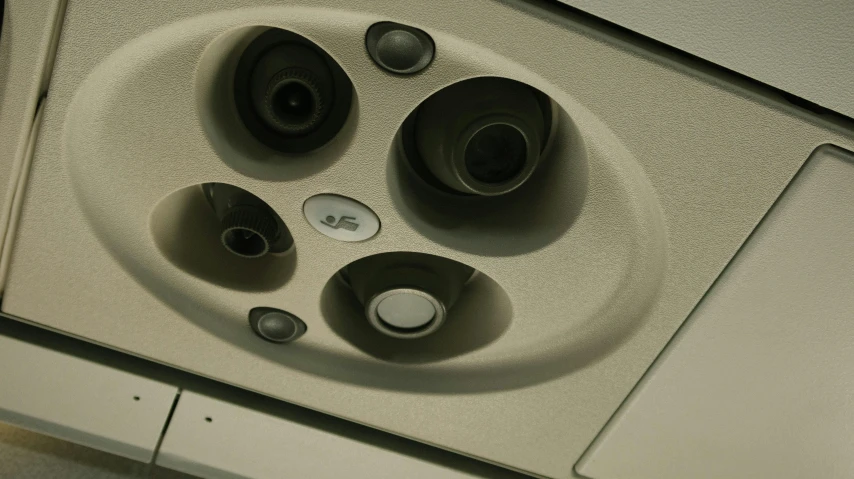 a close up of a sink in a bathroom, a microscopic photo, inspired by Robert Bechtle, unsplash, video art, subwoofer, ceilings, with multiple eyes, gamecube