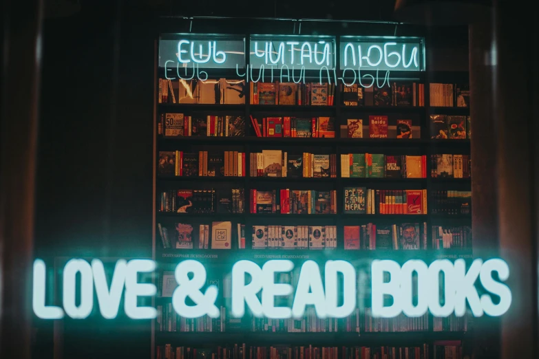 a neon sign that reads love and read books, pexels contest winner, alexey gurylev, 2 0 0 0's photo, magazine photo, instagram photo