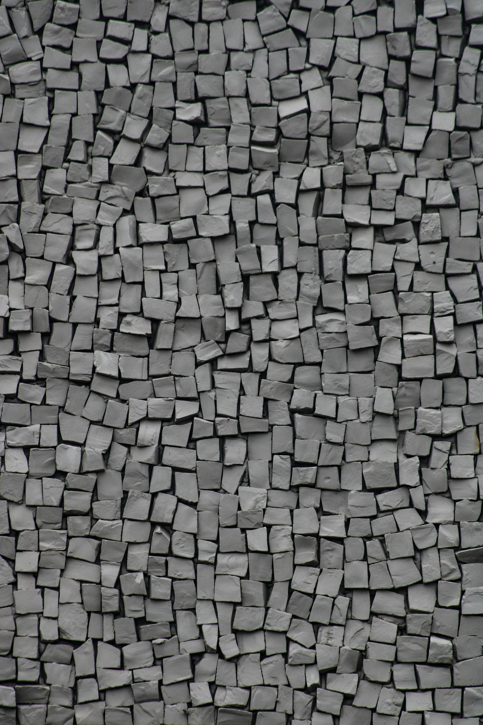 a black and white photo of a brick wall, a mosaic, by Kim Tschang Yeul, polycount, conceptual art, 2 5 6 x 2 5 6, pebbles, roofing tiles texture, cube