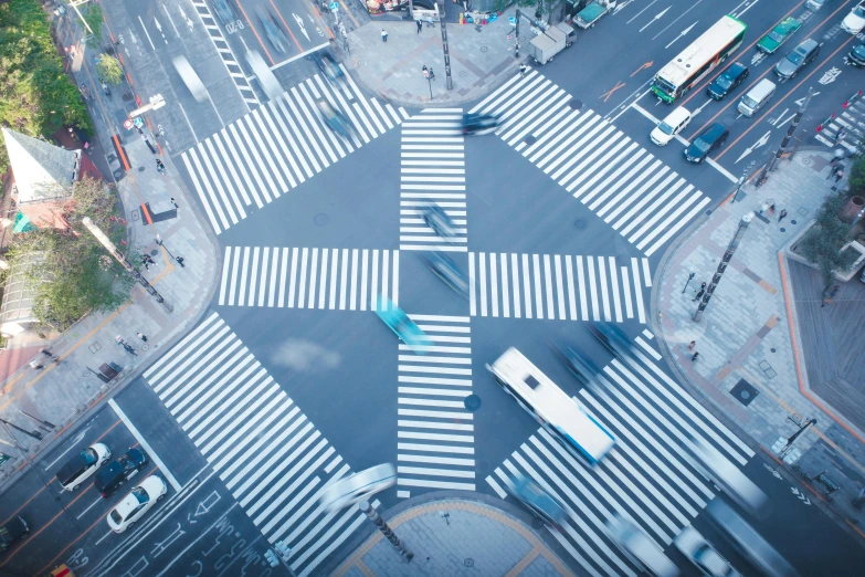 an aerial view of a busy city intersection, trending on unsplash, hypermodernism, square, rinko kawauchi, crossing road, thumbnail