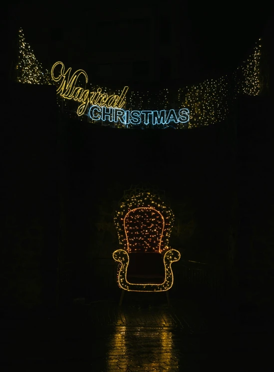 a christmas light display in a dark room, by Julia Pishtar, sitting on a golden throne, sign, unreal maya, promo image