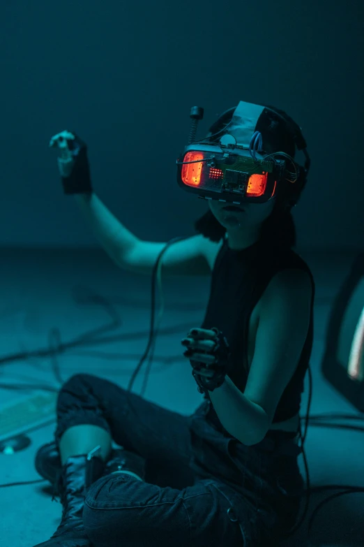 a woman sitting on the ground playing a video game, cyberpunk art, interactive art, wearing a vr headset, into the mirrorverse, promo image, siggraph