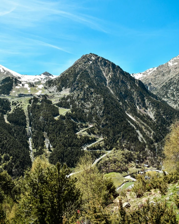 a view of the mountains from the top of a hill, inspired by Eva Gonzalès, pexels contest winner, les nabis, thumbnail, alpine architecture, wide high angle view, high resolution photo