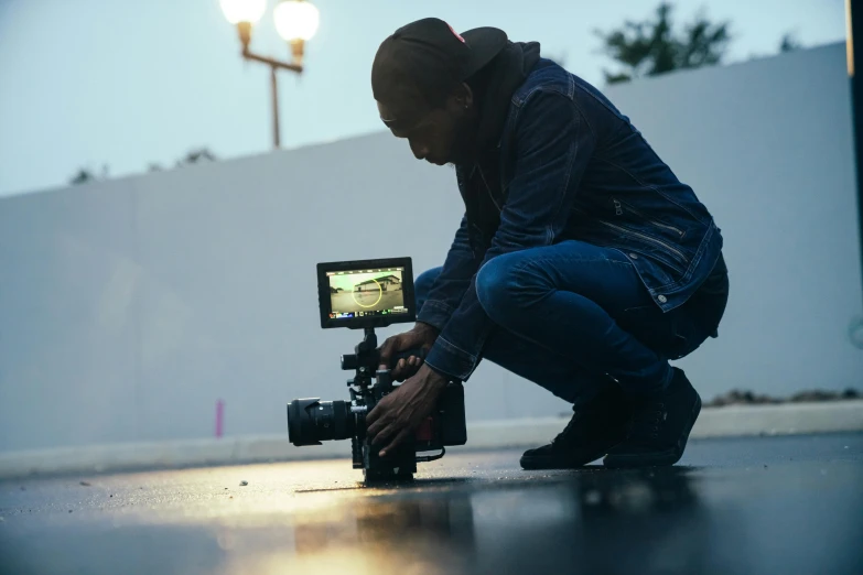 a man squatting down in front of a camera, pexels contest winner, video art, cinematic outdoor lighting, smartphone footage, sony a 7 s, chasing action scene